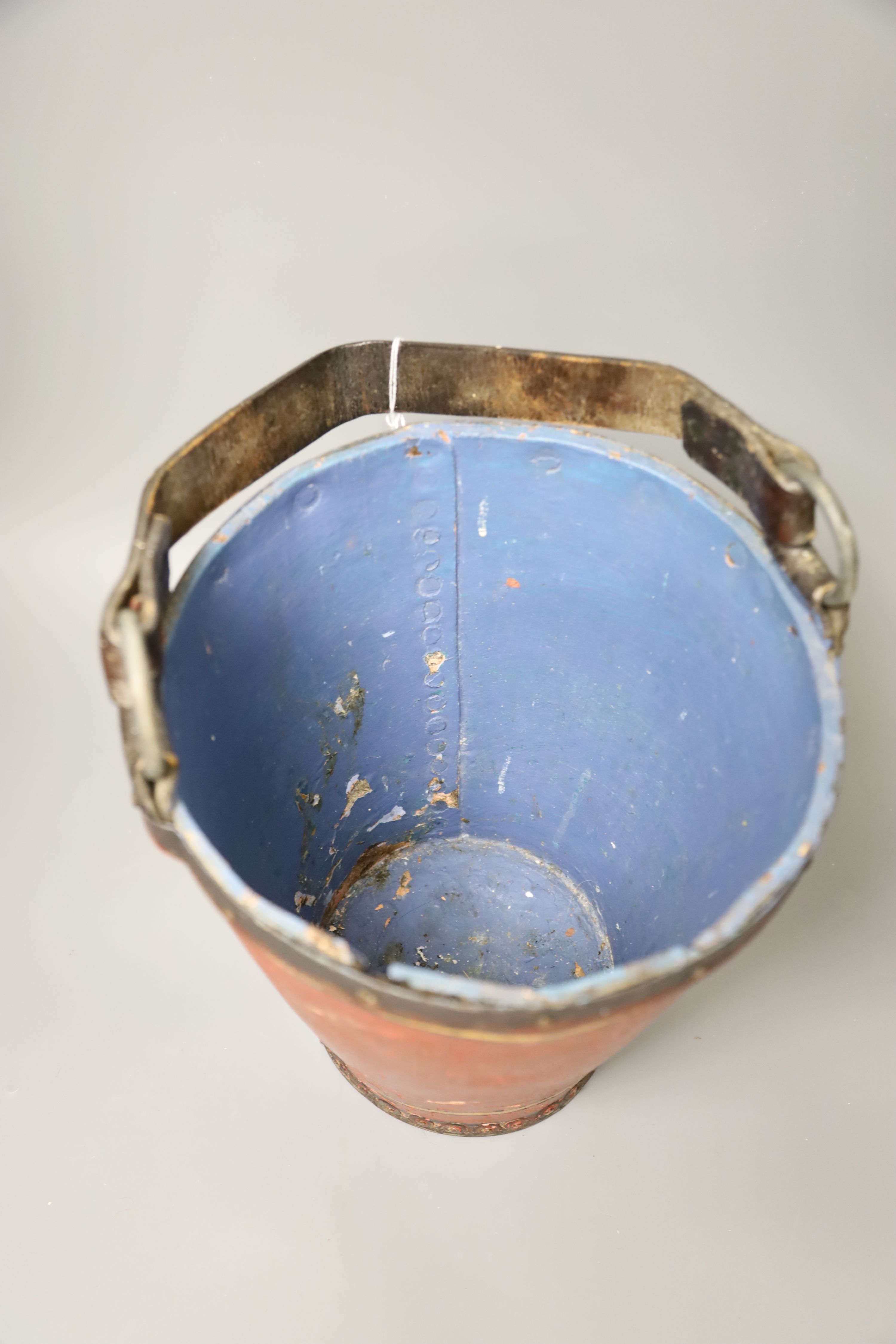 A painted leather fire bucket, height 34cm (handle down)